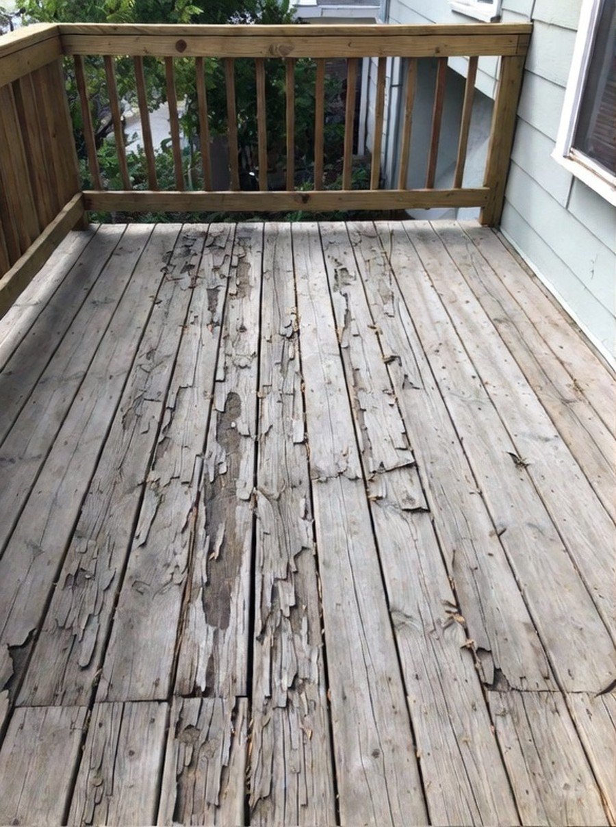 Before deck repaint - weathered peeling wood